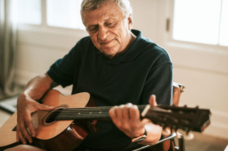 man playing the guitar